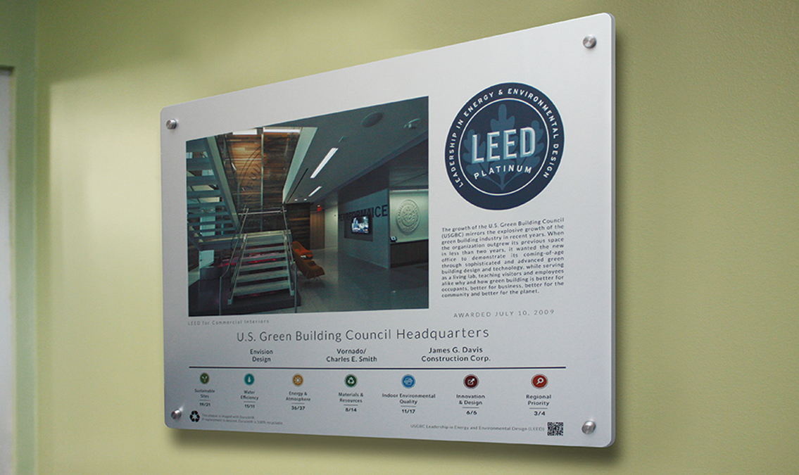 A LEED certification plaque mounted on a wall, indicating a building has met green building standards