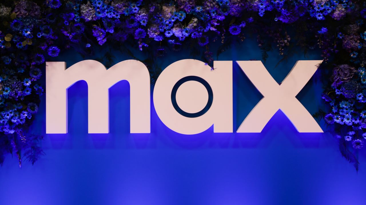 Max branding displayed at a Warner Bros. Discovery industry event with step-and-repeat signage